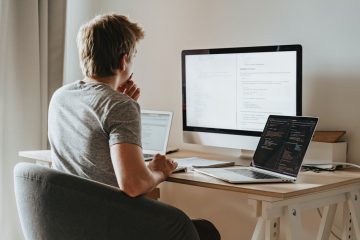 man looking at laptop