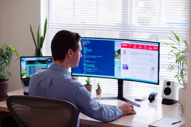 web developer working on his desk